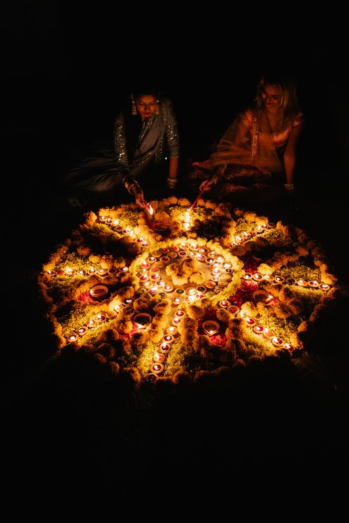 Women Sitting by Circle of Candles